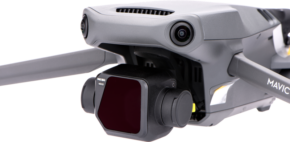 800q-01_118280 Close-up of a grey DJI Mavic 3 drone with Nisi Filter For Mavic 3 ND32 attached to the camera and gimbal system, the propeller arms visible against a white background.