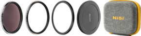 800q-01_121365 The NiSi Filter Swift System Add On Kit 67mm includes a camera lens filter, lens adapter ring, thin metal ring, black NiSi branded lens cover and a grey fabric case with yellow zipper and NiSi logo.
