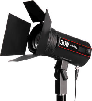 800q-01_127443 The SmallRig 4280 LED Video Light COB RC 30B (30W, black) with barn doors is mounted on a stand against a white background and the cable is connected to the light.