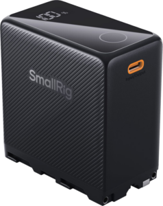 800q-01_127879 Mustassa SmallRig 4469 USB-C ladattavassa kameran akussa NP-F970 (musta) on kuvioitu sivu, latausprosenttia osoittava LED-näyttö yläosassa ja oranssi USB-C-sisääntulo-/ulostuloliitäntä etupuolella.