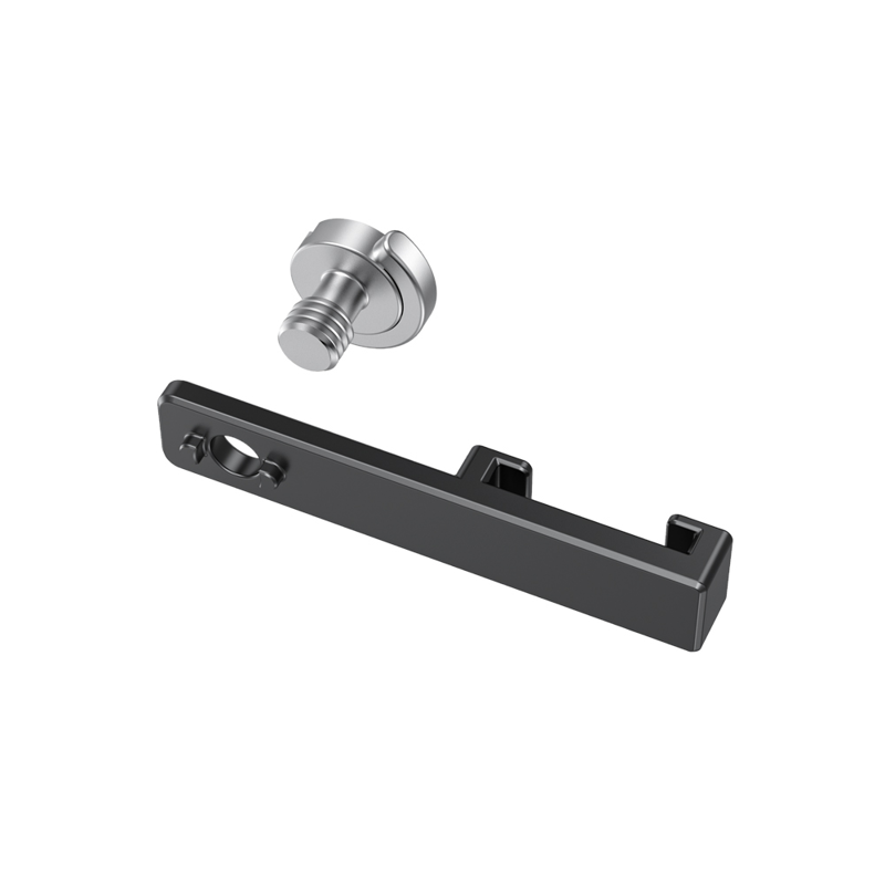 800q-03_113881 SmallRig 2638 Cold Shoe Adapter for Pro Mobile Cage, musta suorakaiteen muotoinen metallikannatin, jossa on pyöreä reikä, on kuvassa erillisellä hopeisella leveäpäisellä ruuvilla varustettuna valkoisella pohjalla.