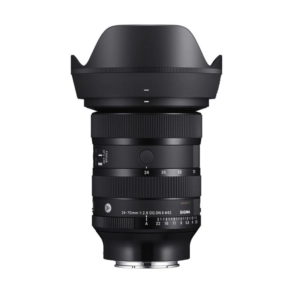 sigma_24-70mm_dn_ii_01 The Sigma 24-70mm f/2.8 DG DN II Art lens (Sony E, €200 cashback) stands upright against a white background, with its large zoom and focus rings and petal-shaped hood attached.