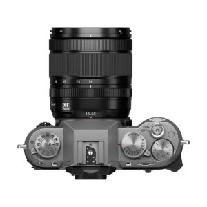 Top view of the Fujifilm X-T50 + XF 16-50mm f/2.8-4.8 (silver) digital camera with detailed dials for settings, mode and exposure, and a hot shoe mount in the centre.
