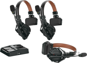 The Hollyland Solidcom C1 Pro Wireless Intercom System is presented with a charging cradle and three ENC headsets, each with black and brown padded ear pads, adjustable headbands and built-in microphones.