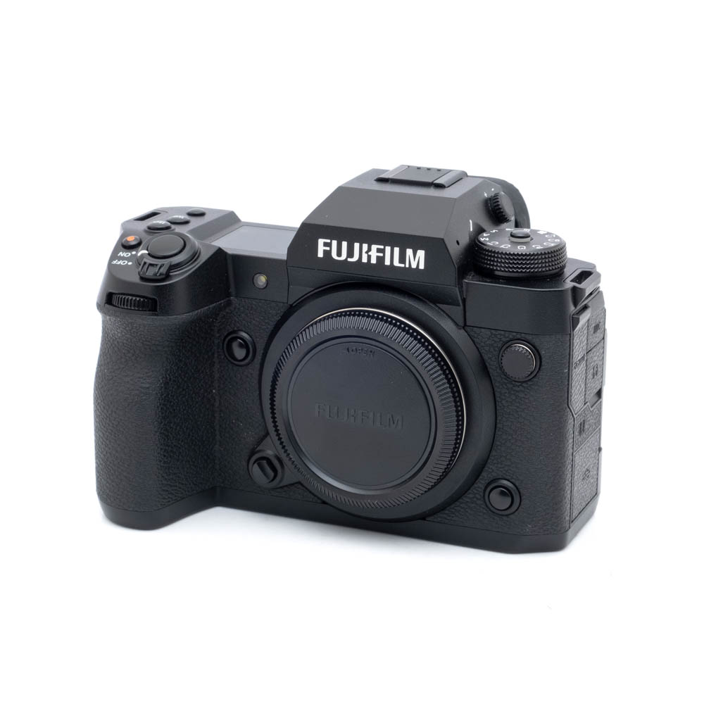 Fujifilm X-H2-1 Käytetty Fujifilm X-H2 (SC 10000, Takuuta 6kk) musta digitaalikameran runko, kuvassa ilman objektiivia, jossa on useita säätimiä ja painikkeita valkoista taustaa vasten.