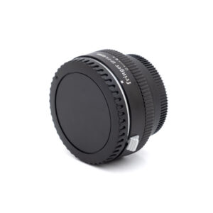 Sringer EF-FX adapter-1 Musta Fringer Canon EF - Fuji X Pro II adapteri (sis. ALV24%) - Käytetty, jossa on harjattu reuna ja objektiivin suojus, on kuvattu valkoista taustaa vasten.