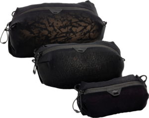800q-01_128335 The black Peak Design Ultralight Mesh Packing Cube Bundle XXS-XS-S features three differently sized, patterned zippered pouches, each with side loops for easy attachment or carrying.