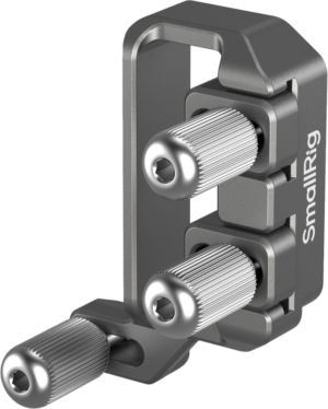 800q-01_128761 Close-up of the SmallRig 4829 USB-C & MULTI cable clamp for Sony FX3/FX30 HawkLock quick release cages, with three knobbly adjustment knobs and a compact, angled frame for secure attachment or adjustment of camera cables.