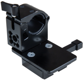 800q-01_122869 The Kupo KS-276 Tube Mounting Coupler with V-Mount Battery Adapter includes a black metal bracket with a round clamp, flat base and multiple holes; it is designed to hold cylindrical objects and securely mount V-Mount batteries.