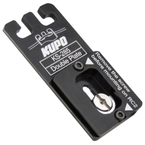 800q-01_122877 The black Kupo KS-285 Double Plate (Quick Release Plate for Arca-Swiss & RC2) has a white marking, a mounting slot and a visible screw. Instructions: remove the screw before attaching to the RC2.