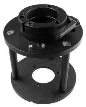 800q-01_122957 KUPO KS-650 Euro Mount Female to Mitchell is a black cylindrical bracket with two round plates connected by rods, a round clamp in the middle, a lever above and several screws and holes in both plates.