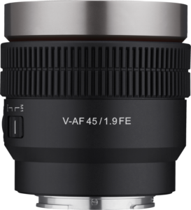 800q-01_124036 A close-up of the black Samyang V-AF 45mm T1.9 lens on the Sony FE shows the silver highlights, textured focus ring and side switch. The brand name is printed in white on the lens against a white background.