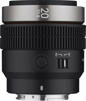 800q-01_127883 A close-up of the Samyang V-AF 20mm T1.9 - Sony FE lens shows the black grooved focus rings, the metal mount and the side switch marked M1 M2.