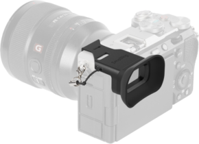 800q-01_128934 SmallRig 4819 Camera Viewfinder Eyecup for Sony Alpha 7C II / Alpha 7CR, black, with mounting loop, attaches to the viewfinder of a silver and black digital camera with a large lens.
