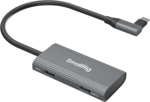 800q-01_129085 The SmallRig 4598 USB-C Hub 4-in-1 is a grey adapter with USB-C 3.1 and USB-C 2.0 ports, an audio adapter and a short cable that ends in a USB-C connector.