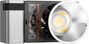 A close-up of the Zhiyun LED Molus X100 COB Light Combo shows its metal housing, exposed heat sink and large textured reflector with a central LED bulb.
