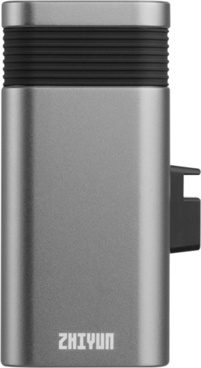 800q-01_123666 Zhiyun Battery Grip for Molus X100 (2600mAh) on suorakulmainen metallinen laite, jossa on musta harjattu yläosa ja näkyvä sivuportti, joka näkyy valkoisella pohjalla.