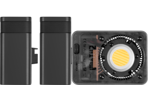 800q-01_127514 The picture shows three black, rectangular Zhiyun LED Molus X60 Pro Cob luminaires: two vertically from the side and one in the front, highlighting the circular yellow LED, black and white markings, gates and labels.