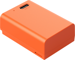 SmallRig 4967 USB-C ladattava kamera-akku EN-EL25 on oranssi suorakulmainen laite, jossa on USB-C-sisääntulo, jossa on merkintä INPUT, ja pieni LED-merkkivalo päällä.