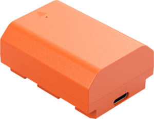 800q-01_129798 The SmallRig 4969 USB-C Rechargeable Camera Battery NP-FZ100 is an orange rectangular device with a sloping top, a small arrow and a USB-C input port on the side.