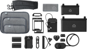 ATOMOS6 The ATOMOS Universal Accessory Kit includes padded bags, battery chargers, batteries, USB cables, adapter plugs, mounting frames, a car adapter and a cleaning cloth, ideal for video production equipment.