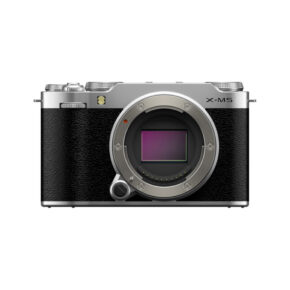 X-M5H11 Fujifilm X-M5 system camera, silver shown with black textured grip on the front, silver top and X-M5 badge. The body of the camera shows the lens mount and image sensor.