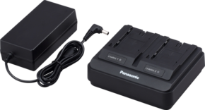 800q-01_107760 The Panasonic AG-BRD50E dual battery charger for AG-VBR series batteries is pictured in black, with two charging slots marked CHARGE 1 and CHARGE 2. The picture shows the mains charger and cable on a light background.