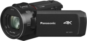 800q-01_109411 Musta Panasonic HC-VX1 -videokamera, jossa on suuri objektiivi, sivussa oleva käsihihna ja ulosvedettävä näyttö, jossa on Panasonic- ja 4K-logot.