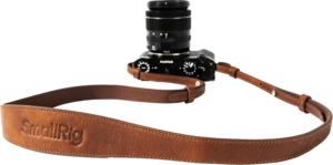 800q-01_130954 Black Fujifilm camera with SmallRig 5209 Universal Leather Camera Shoulder Strap, brown with light background. "SmallRig" is embossed on the strap.