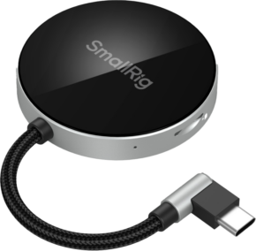 800q-01_130957 The SmallRig 4869 Card Reader SD3.0 is a round, black and silver device with a braided cable, rectangular USB-C connector, sleek modern design and SmallRig logo on top.