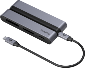 800q-01_131046 SmallRig 4662 CFexpress Docking Station for Creators (Type B) -muistikortinlukija on metallinharmaa kortinlukija, jossa on useita korttipaikkoja ja liitetty USB-C-kaapeli, kuvassa vaalealla pohjalla.