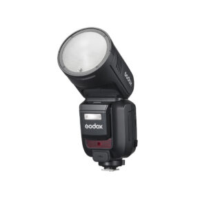 Godox V1001 Fujifilm-kameroille tarkoitettu Godox Speedlite V100 -salama, jossa on pyöreä pää, musta jalusta, digitaalinen näyttö ja painikkeet, kuvattuna ylöspäin suunnattuna valkoisella pohjalla.