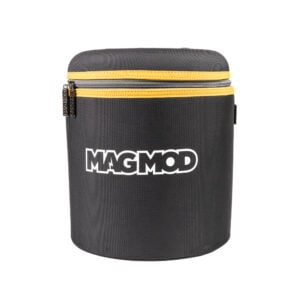 1691582053_064 The MagMod XL case is a cylindrical black case with a yellow zipper and white "MAGMOD" on the front with a white background.