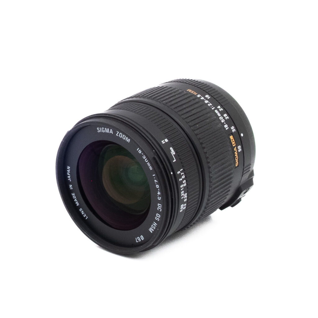 Sigma DC 18-50mm f28-45 OS HSM Nikon F-2 Sigma DC 18-50mm f/2.8-4.5 HSM OS Nikon F DX - Käytetty