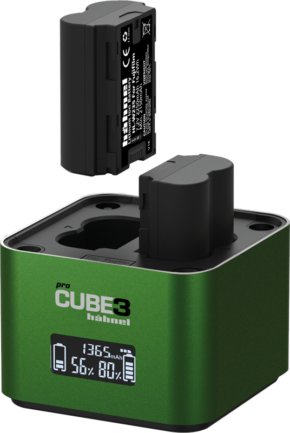 800q-01_130452 The Hähnel ProCube 3 Twin Charger Fujifilm charger has a green metallic finish and an LCD display that shows you the battery charge level and charging progress. A black rectangular battery floats above one of the openings, ready to be inserted.