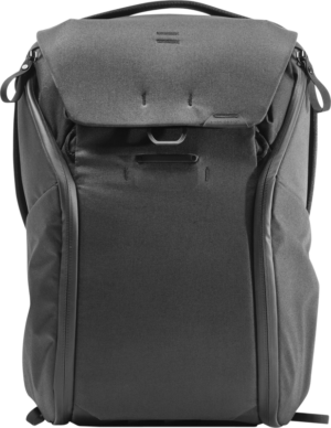 800q-01_123299 The Peak Design Everyday Backpack 20L v2 in black features a modern, structured design with a top flap, front pocket, side zippers, minimal branding, sturdy fabric and a small metal hook on the front.