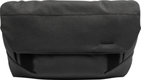 800q-01_123332 Peak Design The Field Pouch v2 in black is a sleek, minimalist rectangular canvas bag with a flap closure and a small triangular logo on the front, perfect for carrying small items or accessories.