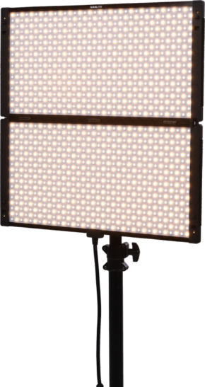 800q-01_127903 The Nanlite PavoSlim 240B LED panel is a rectangular, two-part LED luminaire with a base, both parts of which emit a warm white light. A power cord hangs from the centre, set against a plain, light background.