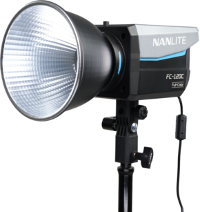 800q-01_130534 The Nanlite FC-120C LED Color Spot Light is mounted on a stand with a large silver reflector and its power cord is plugged into the side.