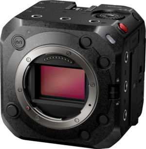 800q-01_131088 Close-up of the Panasonic AW-UB50E video camera, a compact black, cube-shaped digital movie camera with a visible image sensor, multiple buttons and connection ports on the sides. There is no lens attached to the camera.
