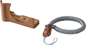800q-01_133552 SmallRig 5432 Leather Half Case Kit for Canon EOS R50 V Brown ja harmaa punottu rannehihna ruskealla nahkakiinnityksellä, molemmat vaalealla pohjalla.