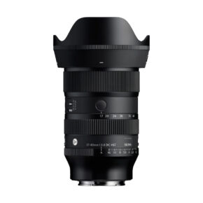 Sigma_17-40mm_f18 (2) Black Sigma 17-40mm f/1.8 DC Art lens for Sony E with focus and zoom rings, aperture markings and a large lens cover on a white background.