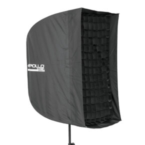 1335335526_327 The Westcott 40 degree grid 41 x 76 cm for the Apollo Strip is mounted on a black softbox luminaire with a grid mounted on a base with the Apollo branding on the side.