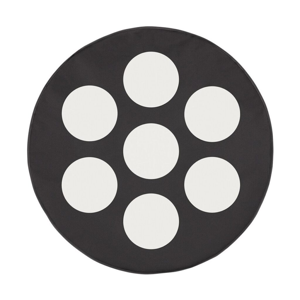 1695283364_576 The Westcott Pro Light Mods Octa 36 (91 cm) is a round black carpet with seven evenly spaced white circles arranged in a hexagonal pattern when viewed from above against a white background.