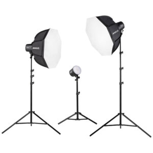1707393987_167 The Westcott U60-B Bi-Color LED 3-Light Softbox Kit includes three studio lights on stands: two large white softboxes on each side and one bare bulb in the middle, all against a white background.