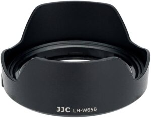 Musta JJC EW 65B Canon -vastavalosuoja, jossa on terälehden muotoinen kuvio, näkyy valkoista taustaa vasten.