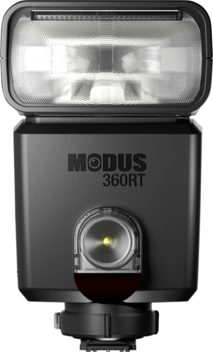 800q-01_111657 Close-up of a Hähnel Modus 360RT Speedlight MFT flash, highlighting the front lens, brand and control components.