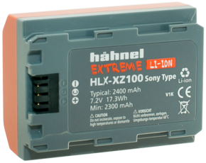 800q-01_123371 Grey Hähnel Battery Extreme Sony HLX-XZ100 / NP-FZ100 battery with orange accents, marked 2400 mAh, 7.2V, 17.3Wh, suitable for Sony cameras, with certification and warning symbols.