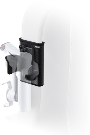 800q-01_133854 Insta360 Flow 2 Pro Backpack Mount The backpack mount is attached to a white car seat that supports the arm of the camera; the seat appears partially transparent to highlight the mount and camera position.