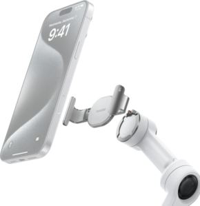 800q-01_133855 The silver smartphone is held by the Insta360 Flow 2 Pro Magnetic Phone Clamp (Stone Grey), which is attached to the end of a white adjustable robotic arm against a light background.